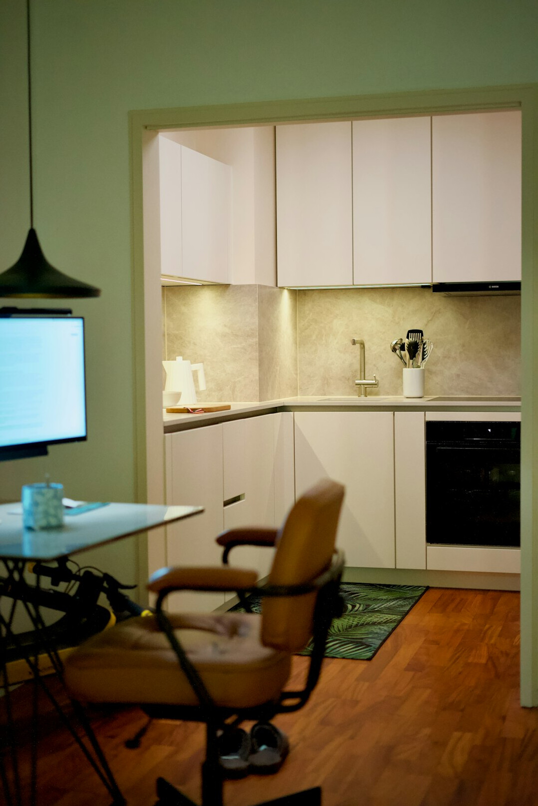 Modern office interior with an ergonomic chair and wooden desk